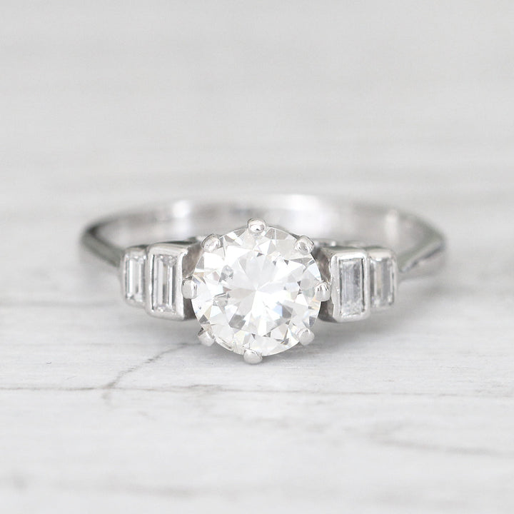 Vintage 1.23 Carat Brilliant Cut Diamond Solitaire with Baguette Diamond Shoulders