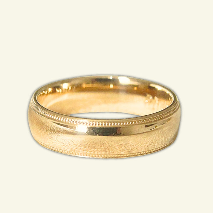 The Court Shape Wedding Band with Mill Grain Edges