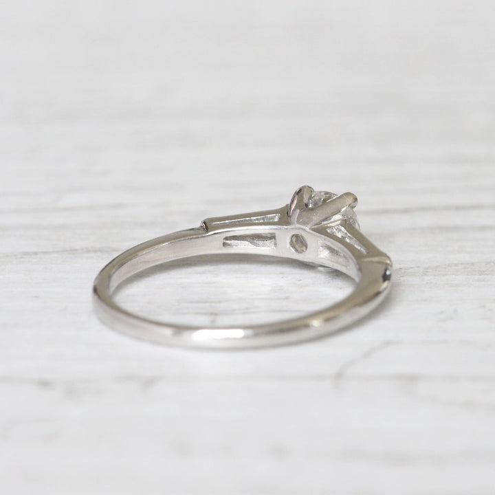 Vintage 0.65 Carat Brilliant Cut and Tapered Baguette Cut Diamond Solitaire