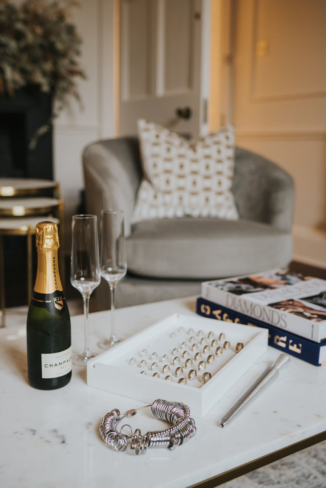 wedding ring appointment with ring sizer and champagne