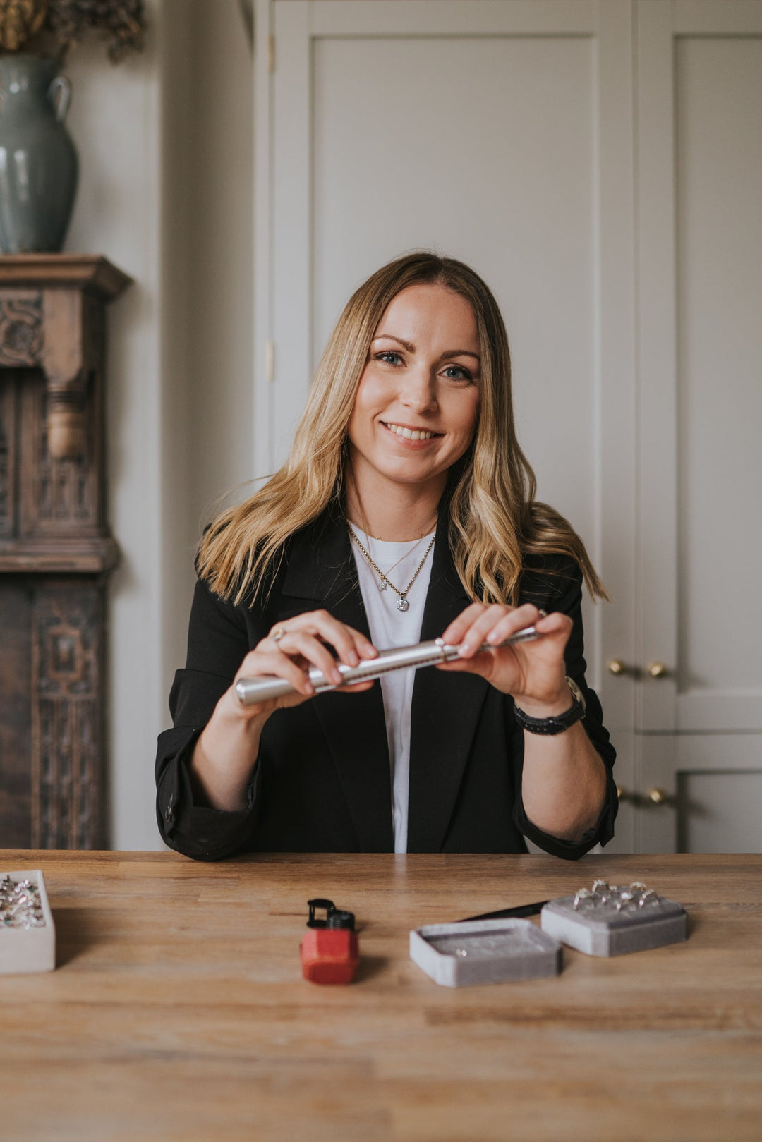 Melissa Holt, founder of Henrietta & Co, sizing an antique diamond ring.